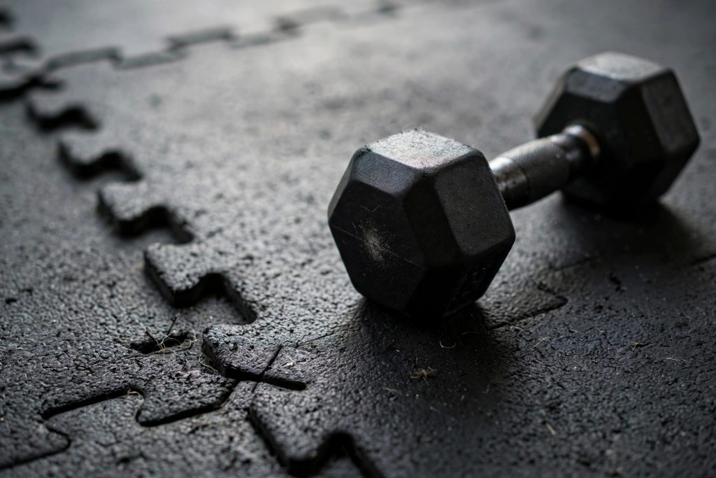Close-up of interlocking rubber gym floor tiles